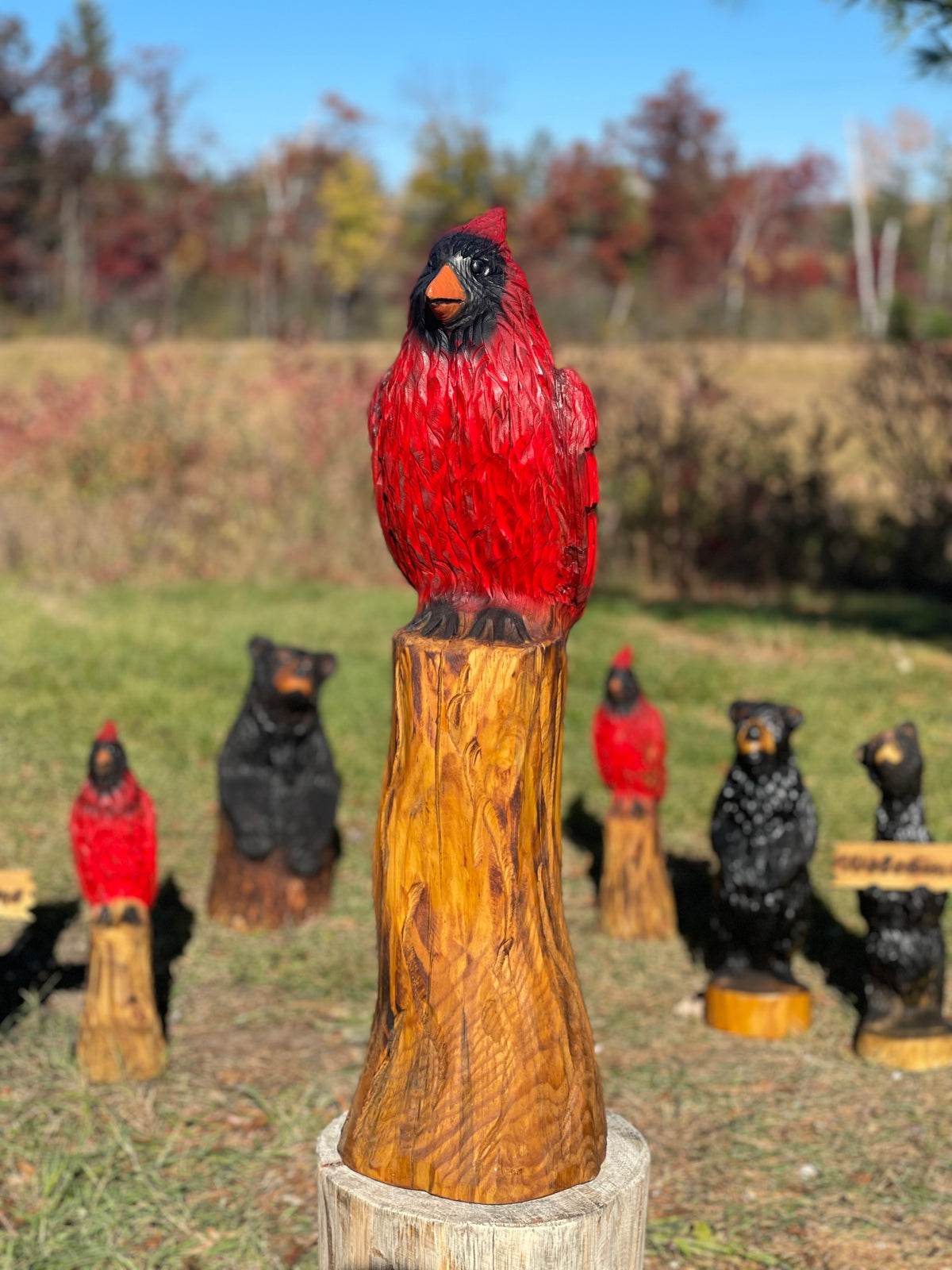 Large cardinal chainsaw carving